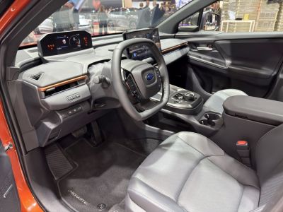 Electric vehicle interior with digital dashboard and touchscreen control center