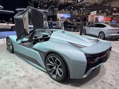 Electric hypercar rear with butterfly door and aerodynamic design