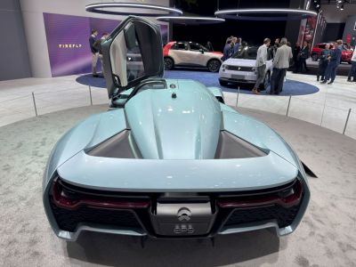 Rear view of sports vehicle with butterfly door and aerodynamic design