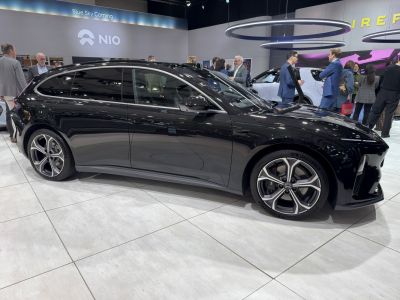 Aerodynamic black wagon with polished alloy five-spoke wheels