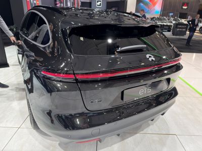 Rear view of hatchback with wrap-around light bar and integrated spoiler