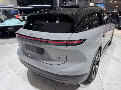 Rear view of electric SUV with continuous LED tail light