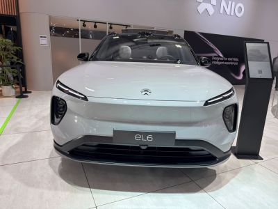 Sleek front view with slim LED headlights and aerodynamic hood