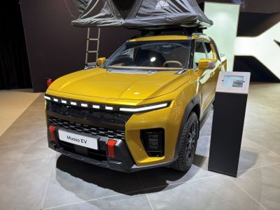 Electric pickup with roof tent and modern front lighting