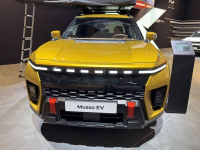 Front view of SUV with LED headlights and red tow hooks