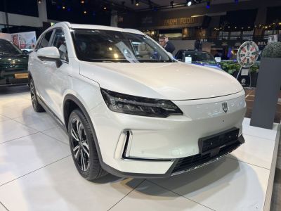 Front view of SUV with LED headlights and aggressive bumper design