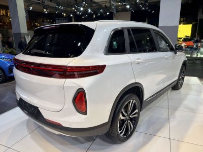 Rear and side exterior of a modern SUV with sleek tail lights and stylish alloy wheels