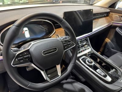 Digital instrument cluster and touchscreen with multifunction steering wheel