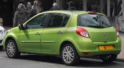 Green 5-door hatchback side profile with alloy wheels and rear light cluster
