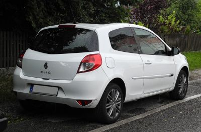 White 3-door hatchback rear-side with alloy wheels and tinted windows
