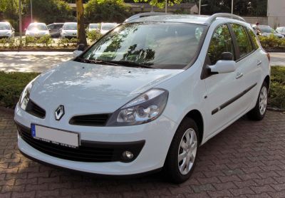 Front side view with distinct headlights and roof rails