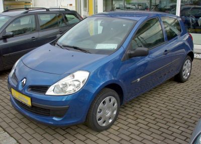 Compact blue hatchback with clear headlights and 3-door design