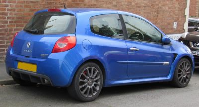 Rear side view of a blue 3-door hatchback with alloy wheels