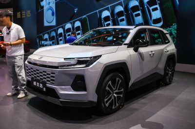 Modern SUV front fascia and side profile with LED lights and hexagonal grille