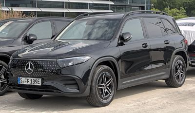 Electric SUV with sleek front grille and star-pattern detailing