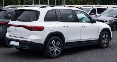 Rear and side view of a white electric SUV with LED taillights and alloy wheels