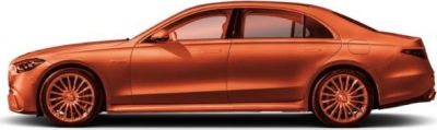 Side profile of luxury sedan with multi-spoke sporty alloy wheels in striking finish
