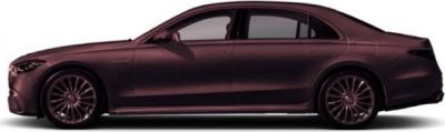 Sedan side profile with coupe roofline and multi-spoke wheels