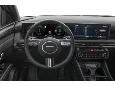 Digital instrument cluster and infotainment touchscreen in modern vehicle cockpit