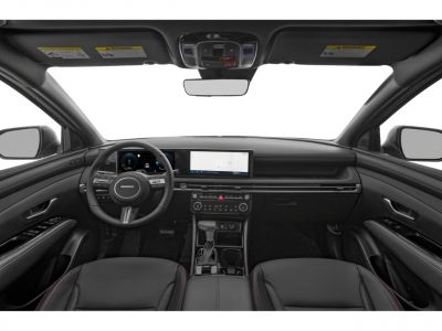 Digital instrument cluster and wide touchscreen display in a modern car interior