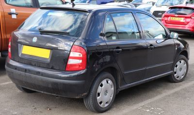 Rear hatchback view with taillights and badge.