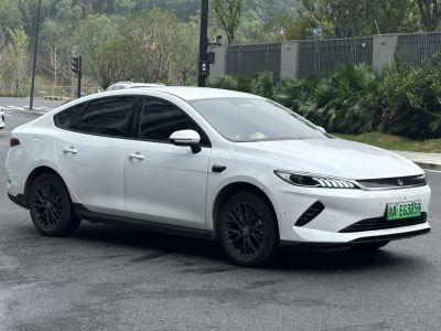 Sleek sedan with slim LED headlights and aerodynamic body design