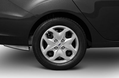 Close-up of alloy wheel with detailed rim and tire tread.