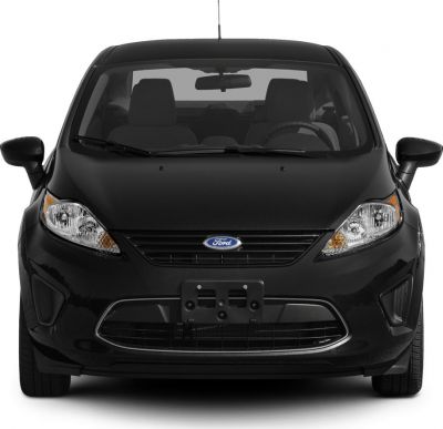 Front view with headlights, grille, windshield and side mirrors