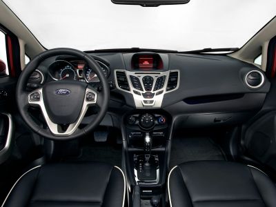 Interior dashboard and steering wheel with control buttons