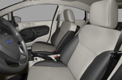 Two-tone front seats and door panel of a compact car interior