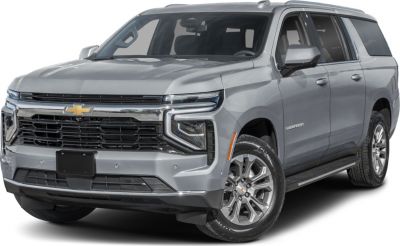 Silver full-size SUV with bold front grille and LED headlights