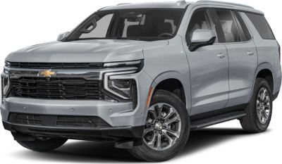 Silver SUV with bold grille and modern headlights
