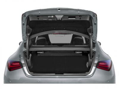 Open rear trunk with spacious cargo area and taillights.
