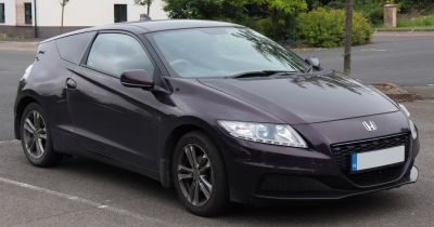 2013 facelift car front and side with hexagonal grille and sleek headlights