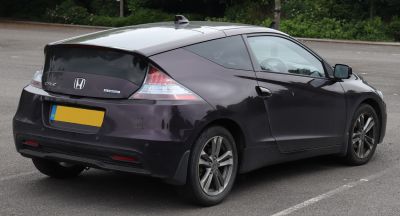 Rear side profile with hybrid badge and tail lights
