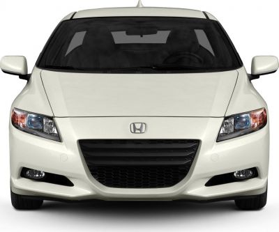 Front view showing grille, headlights, hood of a compact sports coupe