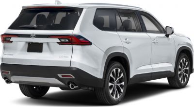 Rear-side profile of modern SUV with sleek taillights and dual exhaust