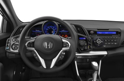 Steering wheel, digital dashboard, and center console with infotainment and climate control