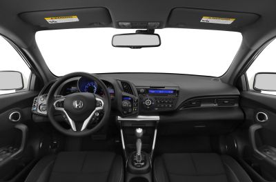 Steering wheel, dashboard, center console, and seats inside a car