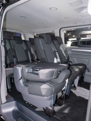 Multi-row seating with foldable seats inside spacious van interior