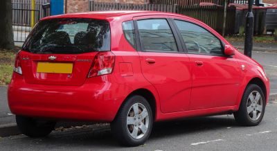 Rear-side view of a compact 5-door hatchback with alloy wheels and prominent taillights
