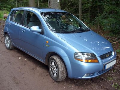 Front view of a 5-door compact hatchback with headlight and alloy wheel details