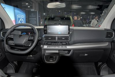 Modern dashboard and steering wheel with digital display and controls