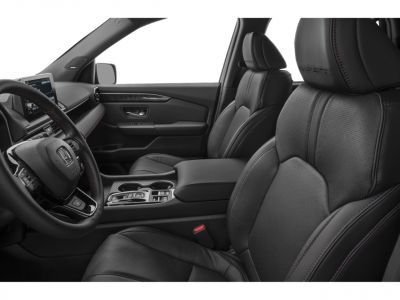 Black leather front seats with ergonomic design and modern dashboard view