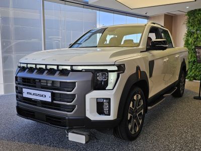 Front view of pickup with bold grille and LED headlights