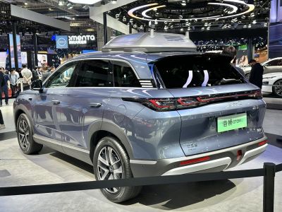 Rear view with sleek LED taillights and rooftop mounted unit