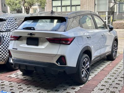 Rear view featuring modern tail lights and distinctive bumper design