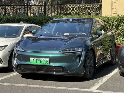 Front view showing sleek LED headlights and aerodynamic design