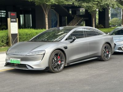 Sleek aerodynamic electric sedan with sporty alloy wheels and modern design