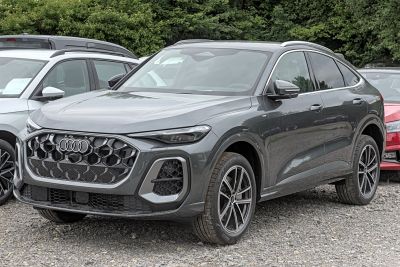 Honeycomb grille and sleek coupe SUV design